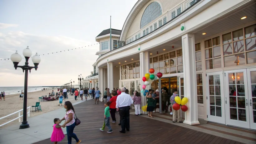Hampton Beach Casino Ballroom exterior with people gathering for community event